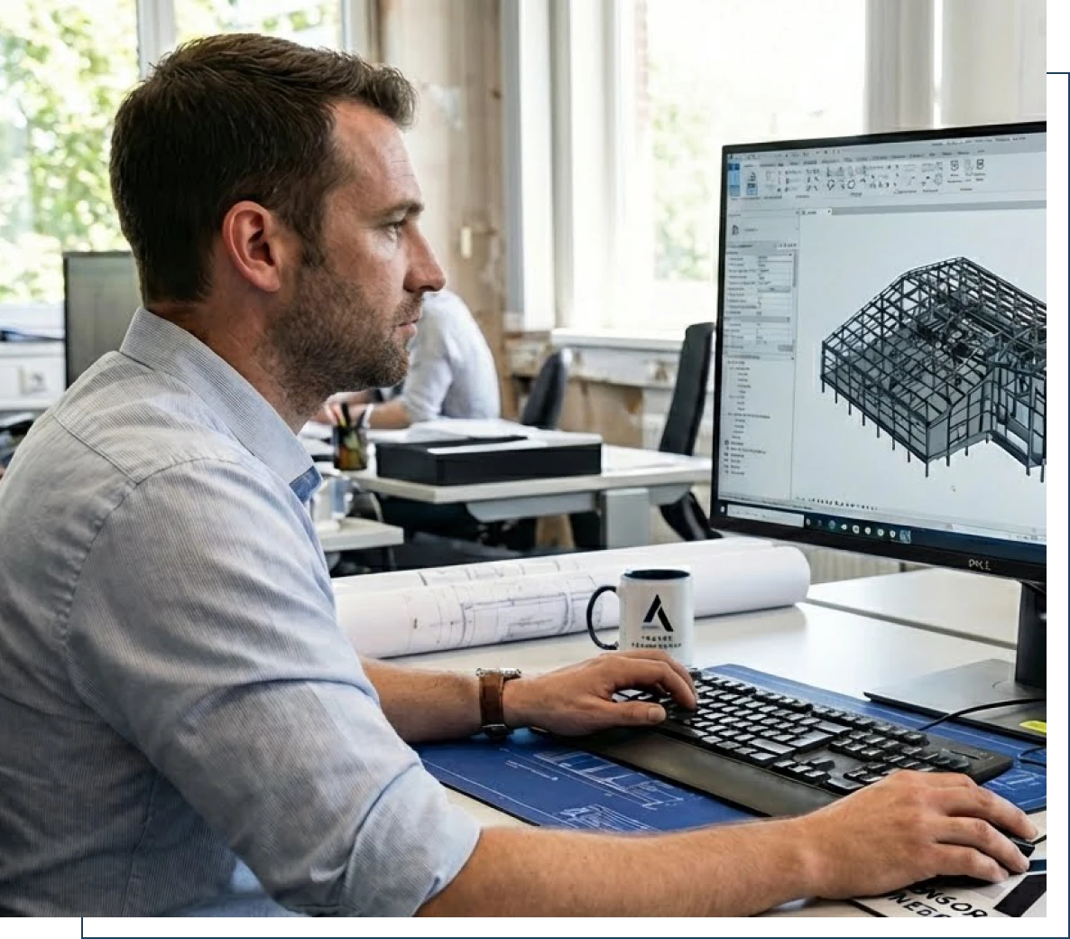 Architect designing building on computer