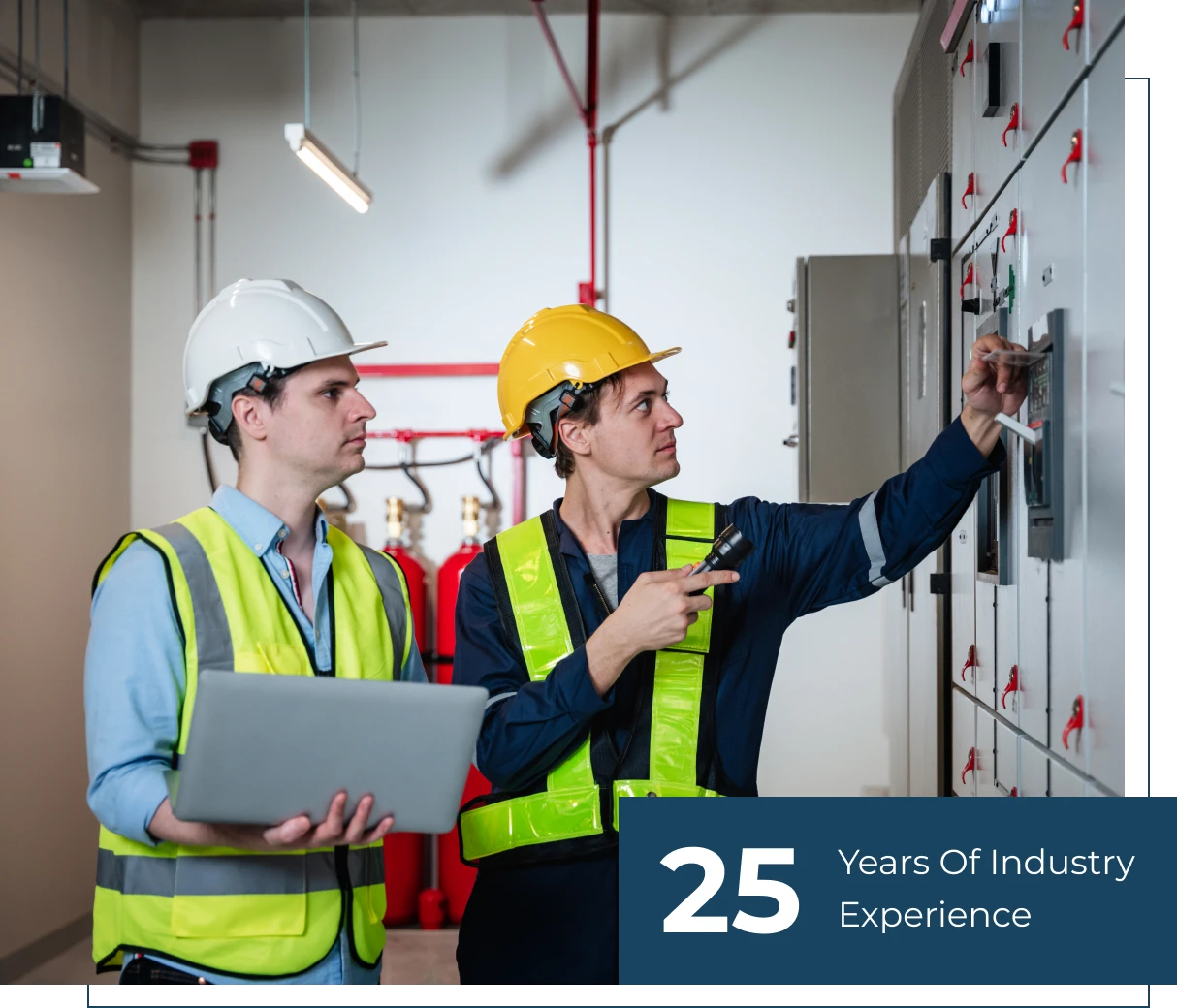 Workers in hard hats and safety vests.