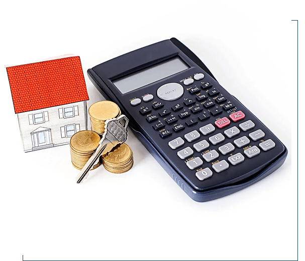 Calculator, coins, and a toy house representing financial planning.